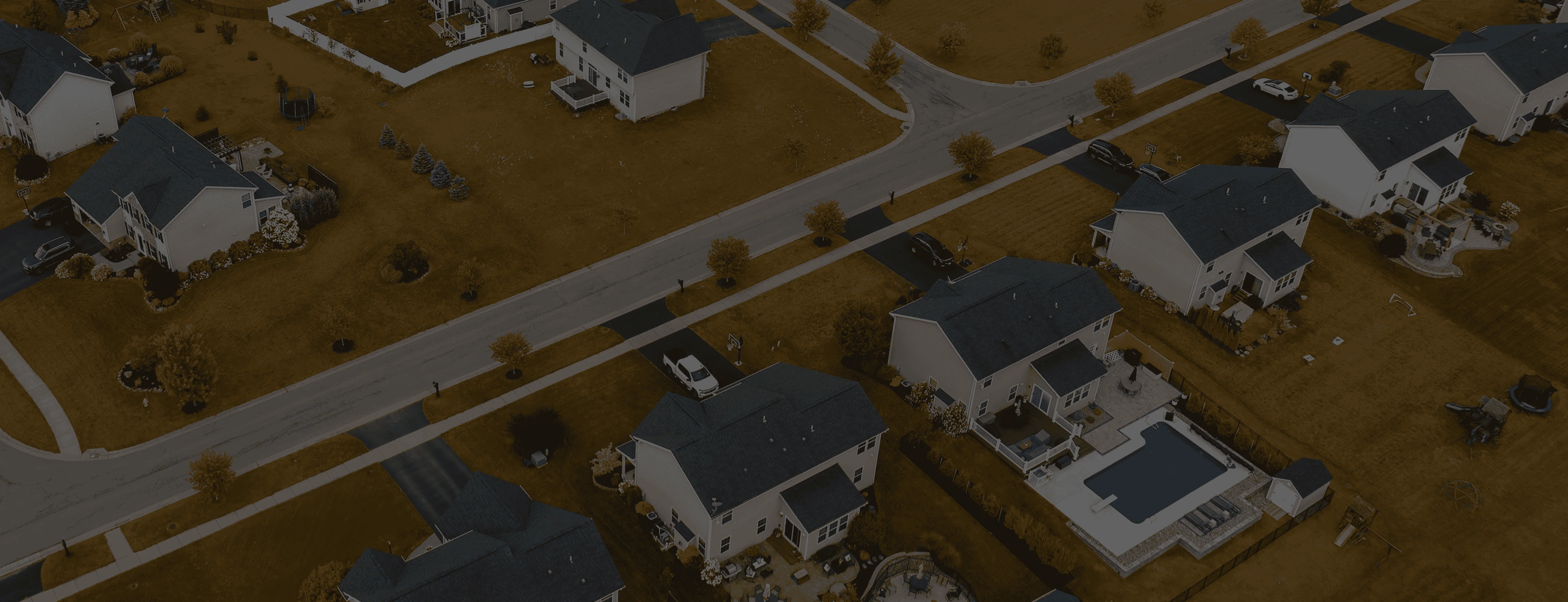 Model house on documents representing real estate planning
