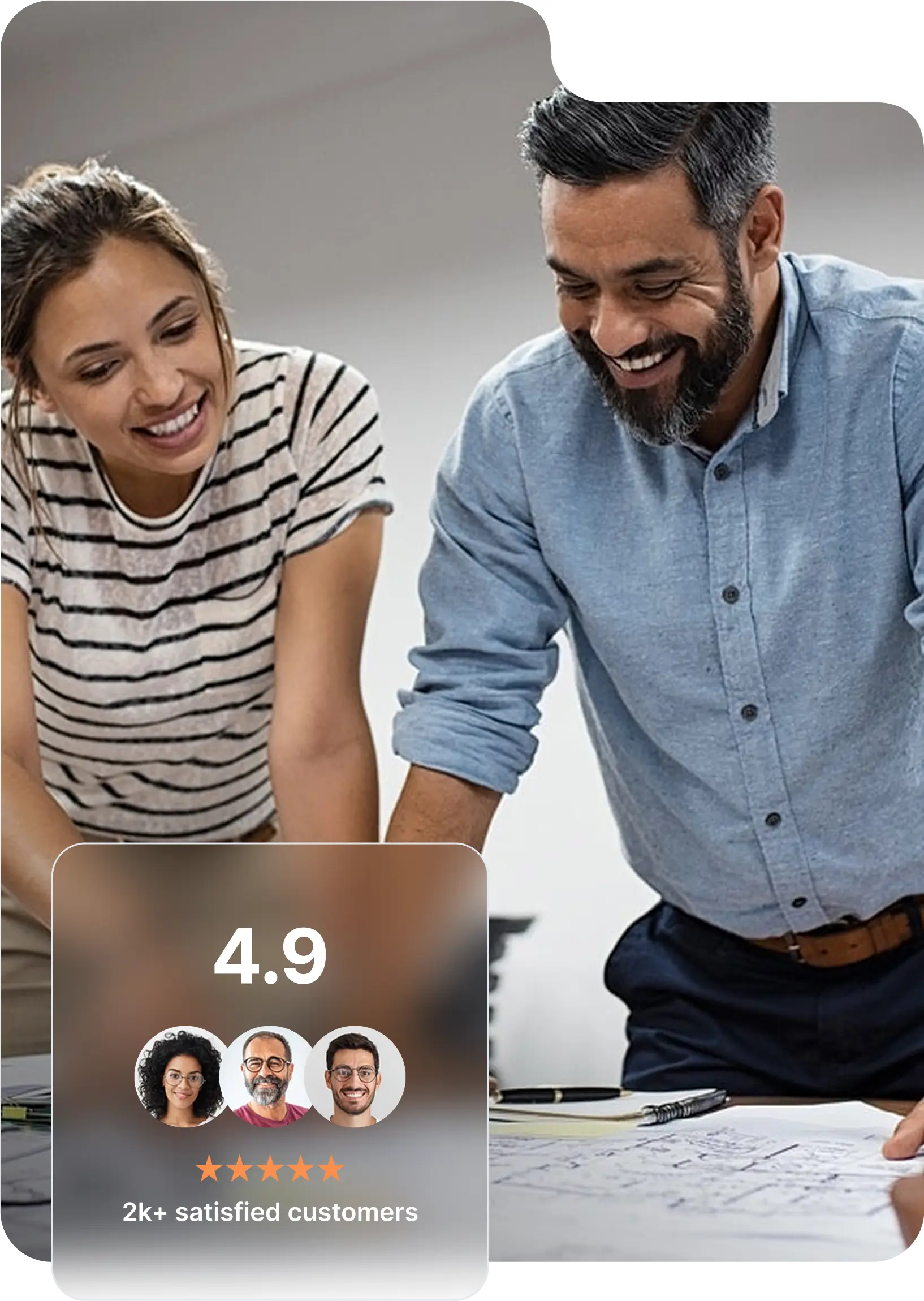 Happy clients reviewing real estate documents